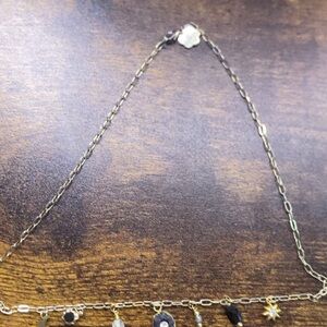 Elegant Black and Gold Charm Necklace